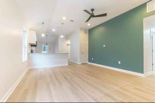 4100 New Willow Rd, Memphis, TN 38111 - unfurnished living room featuring a ceiling fan, light wood finished floors, baseboards, recessed lighting, and vaulted ceiling