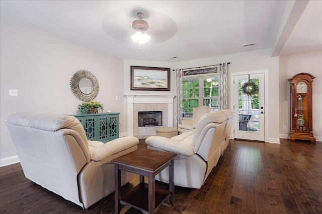 4510 Windway Cv, Bartlett, TN 38135 - living area with a ceiling fan, dark wood finished floors, baseboards, and a fireplace