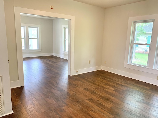 119 Red Bird Rd, Middleton, TN 38052 - unfurnished room with dark wood finished floors and plenty of natural light