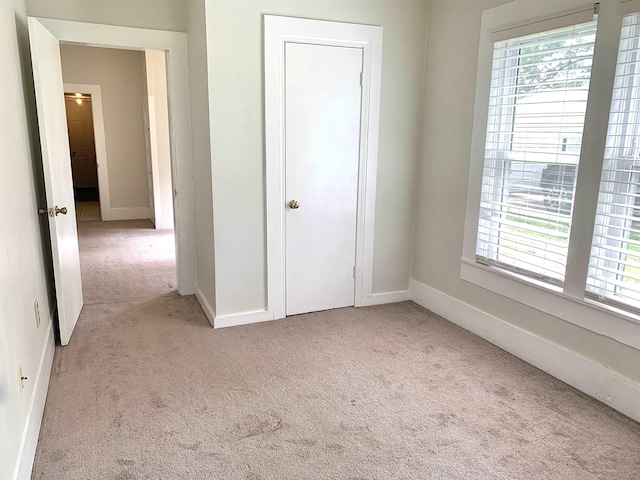119 Red Bird Rd, Middleton, TN 38052 - unfurnished bedroom with light carpet and baseboards