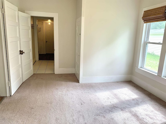 119 Red Bird Rd, Middleton, TN 38052 - unfurnished bedroom with carpet floors and baseboards