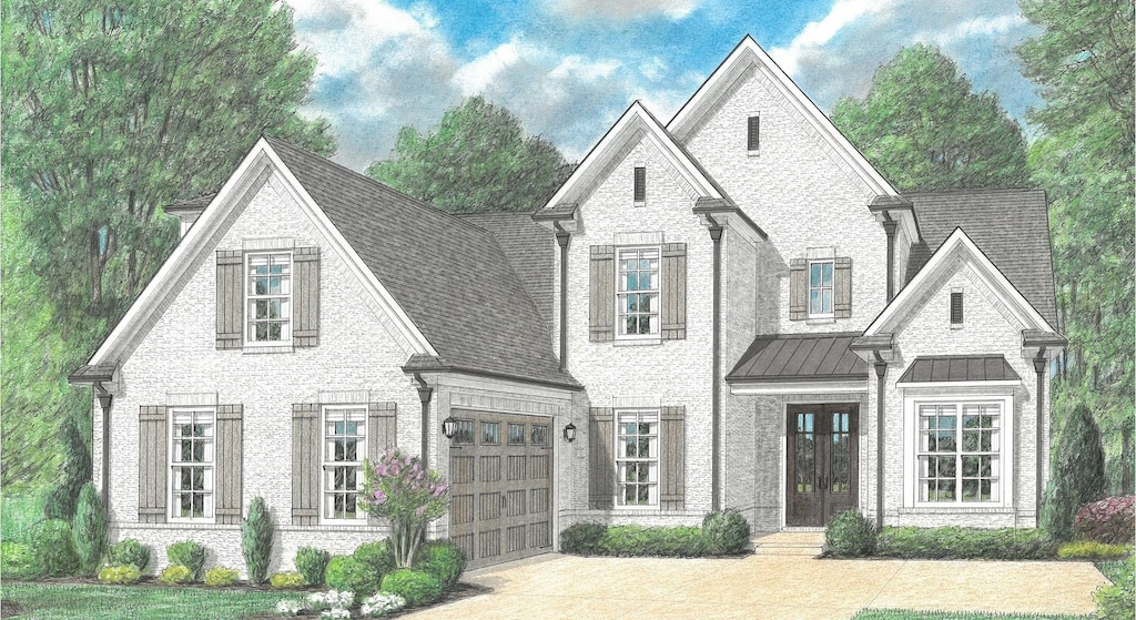 9600 Grays Hollow Dr S, Cordova, TN 38018 - view of front facade featuring driveway, roof with shingles, a standing seam roof, brick siding, and french doors