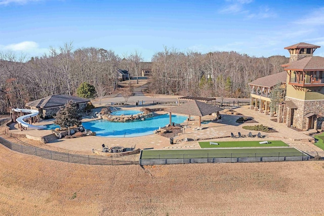 90 Endless View Rdg, Savannah, TN 38372 - view of swimming pool with a fenced backyard, a water slide, a patio, and a view of trees