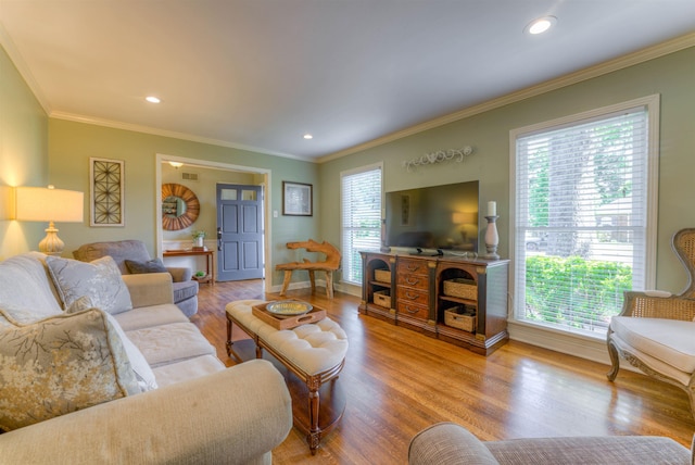 4834 Welchshire Ave, Memphis, TN 38117 - living area with crown molding, wood finished floors, baseboards, and recessed lighting