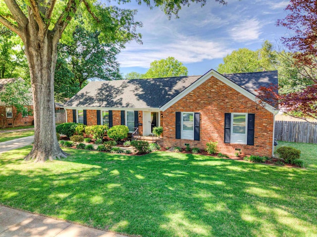 4834 Welchshire Ave, Memphis, TN 38117 - view of front of house featuring brick siding, roof with shingles, and a porch