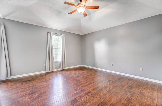 8023 Allbright Cv, Bartlett, TN 38133 - empty room featuring ceiling fan, hardwood / wood-style flooring, a textured ceiling, baseboards, and lofted ceiling