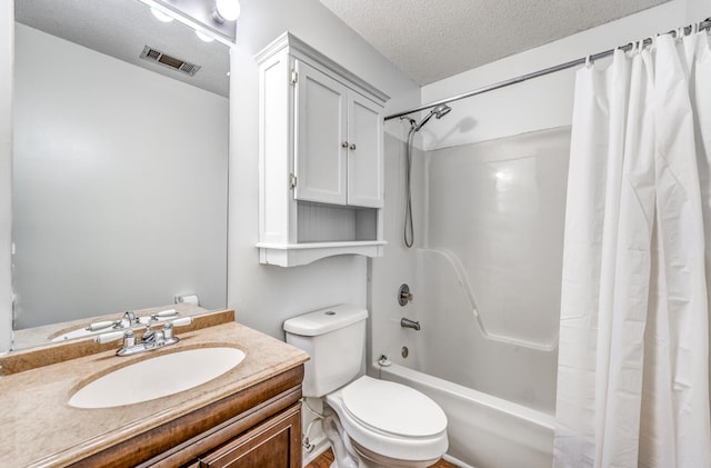 8023 Allbright Cv, Bartlett, TN 38133 - full bathroom with a textured ceiling, shower / tub combo with curtain, vanity, and toilet