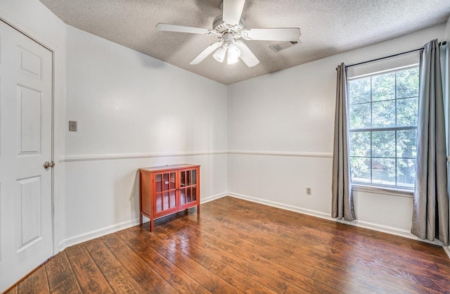 8023 Allbright Cv, Bartlett, TN 38133 - unfurnished room with a textured ceiling, a ceiling fan, wood-type flooring, and baseboards