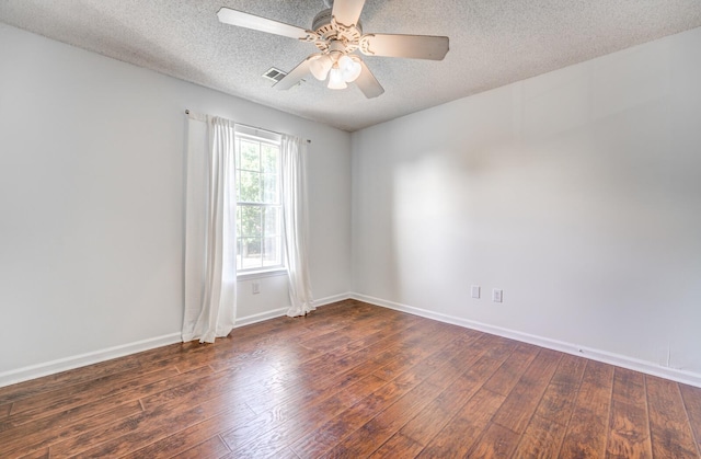 8023 Allbright Cv, Bartlett, TN 38133 - empty room with a textured ceiling, wood-type flooring, baseboards, and a ceiling fan