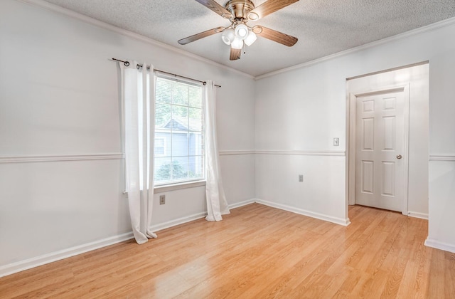 8023 Allbright Cv, Bartlett, TN 38133 - empty room with light wood-style floors, a ceiling fan, crown molding, a textured ceiling, and baseboards