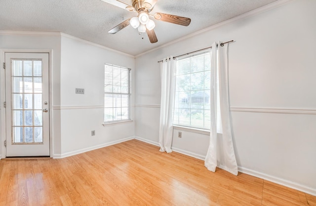 8023 Allbright Cv, Bartlett, TN 38133 - spare room with light wood-type flooring, plenty of natural light, ceiling fan, a textured ceiling, and baseboards