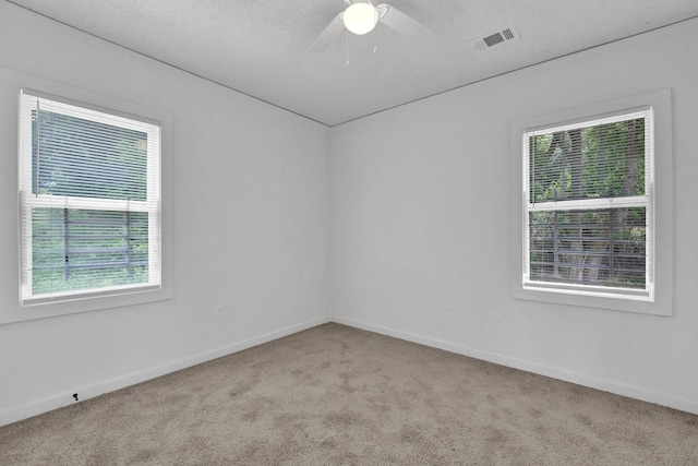 1394 Chadwick Cir, Memphis, TN 38114 - carpeted empty room featuring baseboards and a ceiling fan