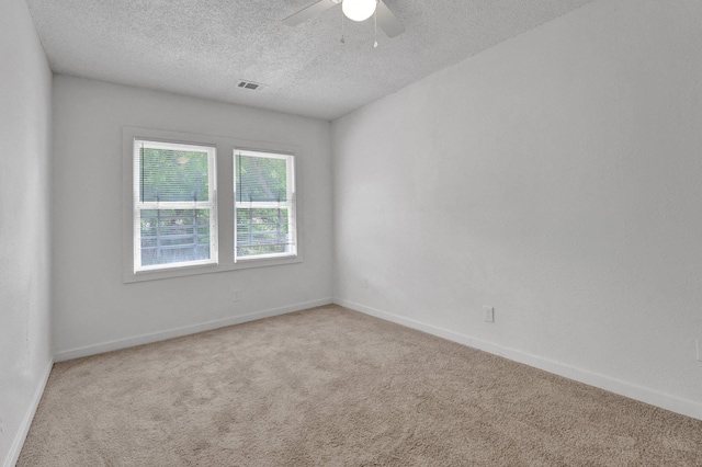 1394 Chadwick Cir, Memphis, TN 38114 - unfurnished room featuring carpet floors, ceiling fan, a textured ceiling, and baseboards