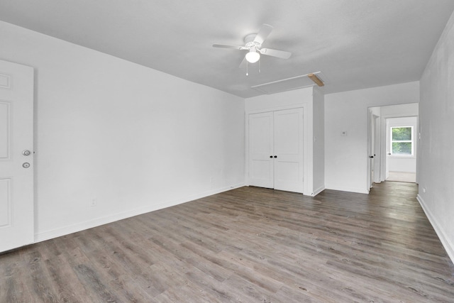 1394 Chadwick Cir, Memphis, TN 38114 - unfurnished room with wood finished floors, ceiling fan, attic access, and baseboards