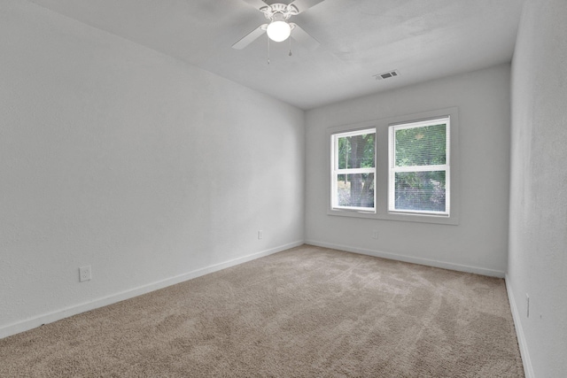1394 Chadwick Cir, Memphis, TN 38114 - empty room featuring carpet flooring, ceiling fan, and baseboards