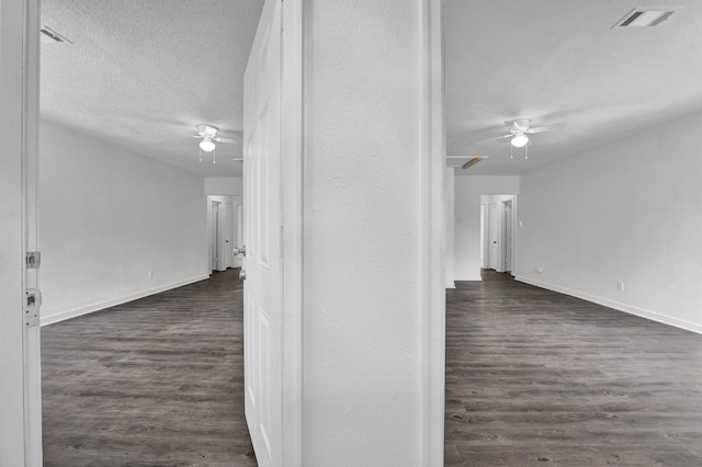 1394 Chadwick Cir, Memphis, TN 38114 - corridor with wood finished floors, baseboards, and a textured ceiling