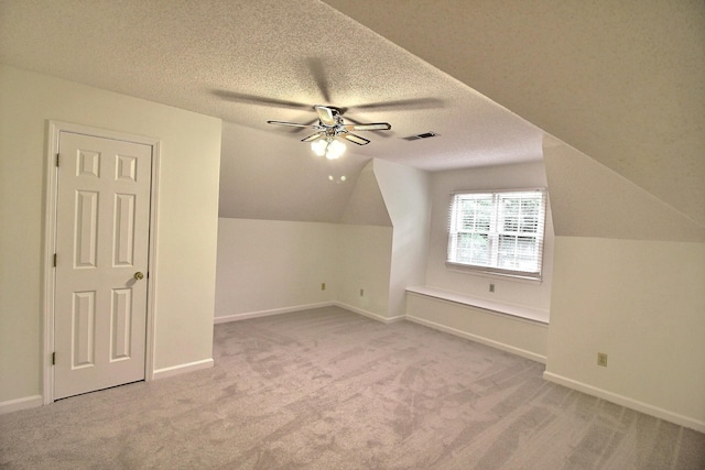 791 Autumn Winds Dr, Collierville, TN 38017 - bonus room with carpet, ceiling fan, lofted ceiling, a textured ceiling, and baseboards