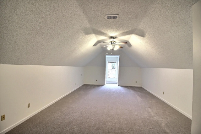 791 Autumn Winds Dr, Collierville, TN 38017 - bonus room with a textured ceiling, carpet flooring, ceiling fan, baseboards, and vaulted ceiling