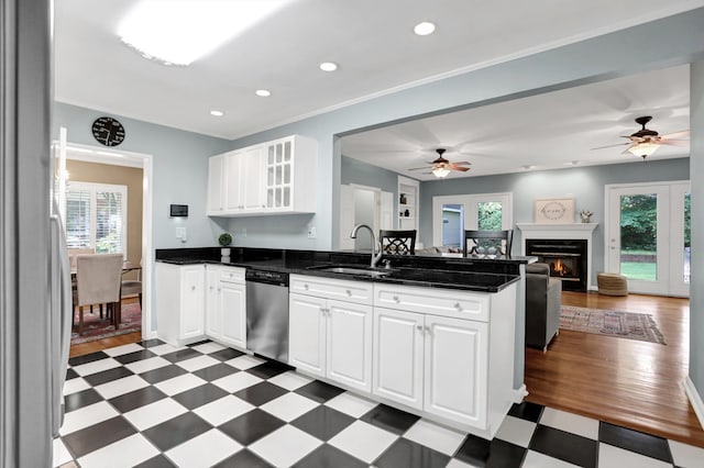 4141 Sequoia Ave, Memphis, TN 38117 - kitchen featuring stainless steel dishwasher, a sink, a peninsula, light flooring, and recessed lighting