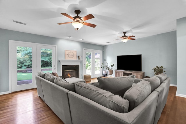 4141 Sequoia Ave, Memphis, TN 38117 - living room with baseboards, ceiling fan, and a premium fireplace