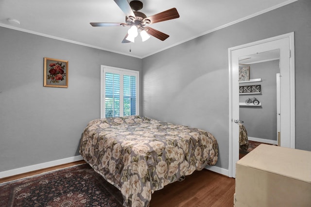 4141 Sequoia Ave, Memphis, TN 38117 - bedroom featuring dark wood-style floors, crown molding, baseboards, and ceiling fan