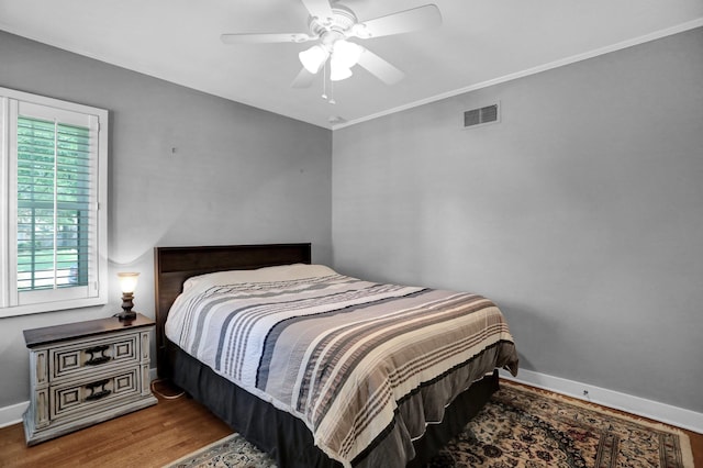4141 Sequoia Ave, Memphis, TN 38117 - bedroom with wood finished floors, baseboards, and a ceiling fan