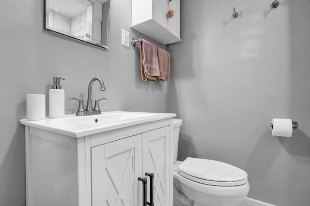 4141 Sequoia Ave, Memphis, TN 38117 - bathroom with toilet, vanity, and baseboards