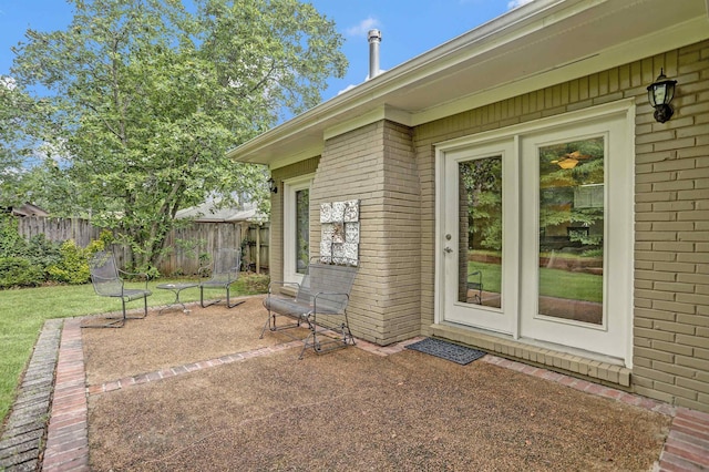 4141 Sequoia Ave, Memphis, TN 38117 - view of exterior entry featuring brick siding and a patio