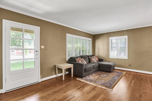 4141 Sequoia Ave, Memphis, TN 38117 - living room featuring wood finished floors, crown molding, and baseboards