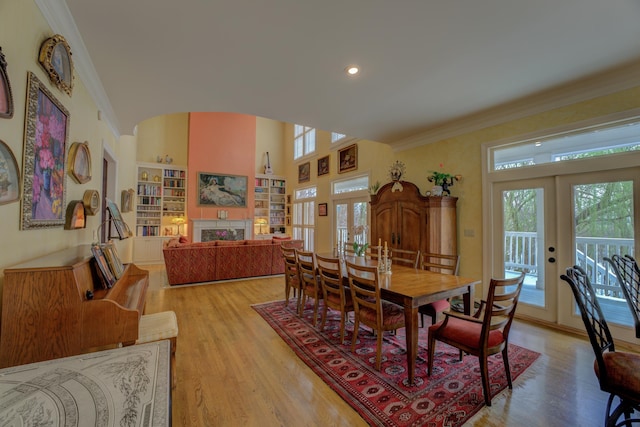 182 Harbor Isle Cir, Memphis, TN 38103 - dining area featuring french doors, plenty of natural light, light wood finished floors, crown molding, and recessed lighting