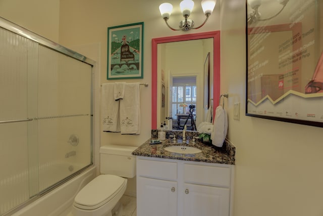 182 Harbor Isle Cir, Memphis, TN 38103 - bathroom with vanity, combined bath / shower with glass door, and toilet