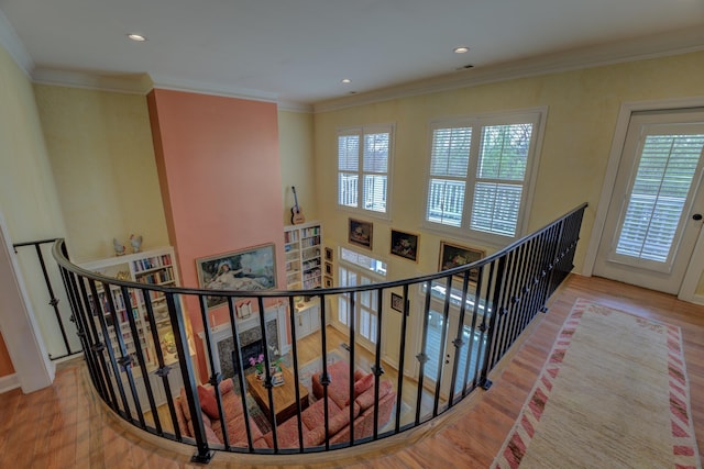 182 Harbor Isle Cir, Memphis, TN 38103 - stairs featuring plenty of natural light, wood finished floors, crown molding, and recessed lighting