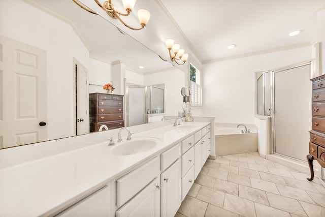 182 Harbor Isle Cir, Memphis, TN 38103 - full bathroom with a shower stall, double vanity, a garden tub, and ornamental molding