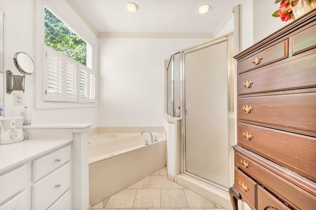 182 Harbor Isle Cir, Memphis, TN 38103 - bathroom featuring a shower stall, a bath, vanity, and tile patterned floors