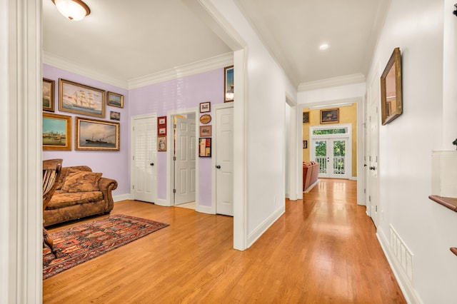 182 Harbor Isle Cir, Memphis, TN 38103 - hall with crown molding, light wood-style flooring, and baseboards