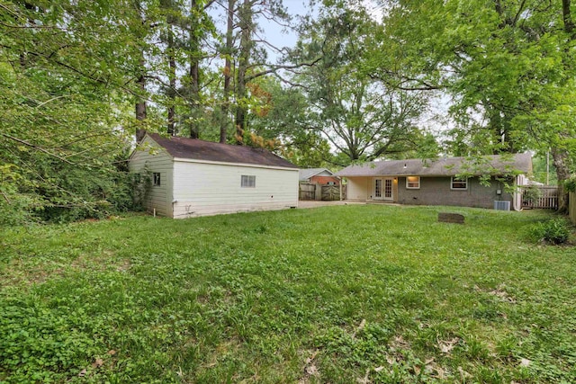 307 Melita Rd, Memphis, TN 38120 - view of yard with an outbuilding, french doors, and central AC