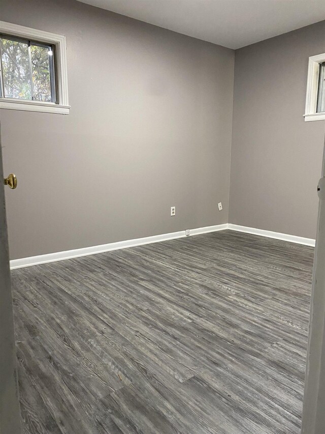 4219 Coventry Ave, Memphis, TN 38127 - spare room with dark wood-type flooring and baseboards