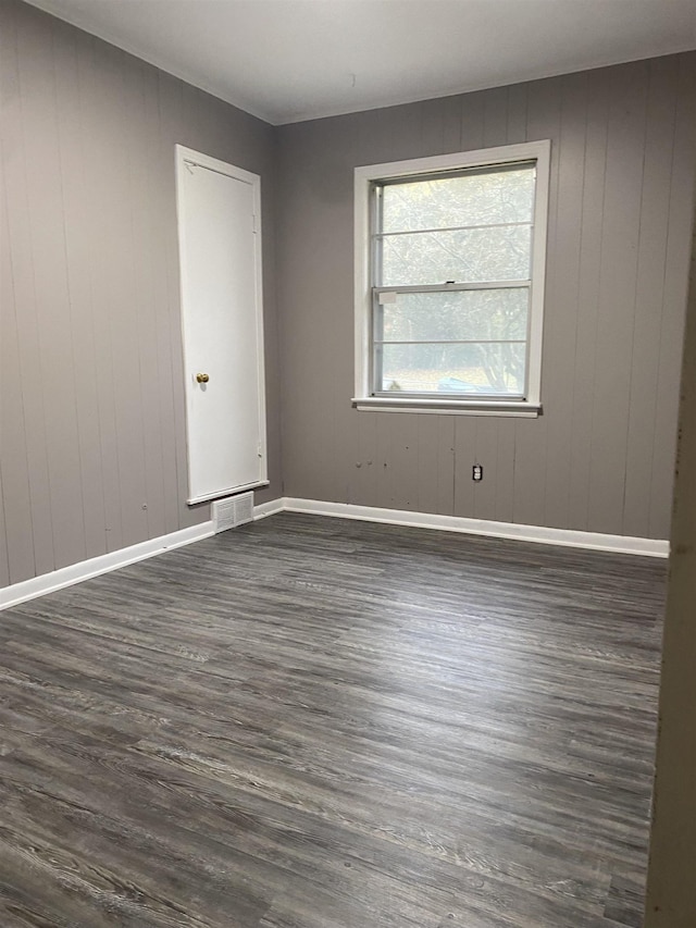 4219 Coventry Ave, Memphis, TN 38127 - unfurnished room with dark wood-style flooring