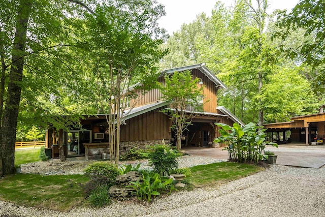 1940 Nuckolls Rd, Rossville, TN 38066 - rear view of house featuring board and batten siding and stone siding