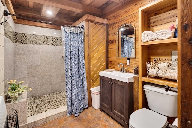 1940 Nuckolls Rd, Rossville, TN 38066 - bathroom featuring wooden ceiling with exposed beams, a tile shower, toilet, vanity, and wooden walls