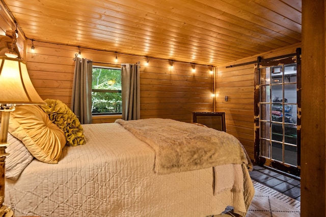 1940 Nuckolls Rd, Rossville, TN 38066 - bedroom featuring wood ceiling and wooden walls