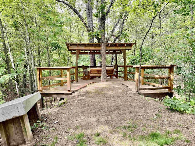 1940 Nuckolls Rd, Rossville, TN 38066 - view of home's community featuring a wooden deck and a forest view