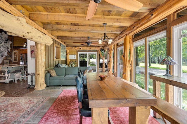 1940 Nuckolls Rd, Rossville, TN 38066 - dining room featuring wood ceiling with exposed beams, plenty of natural light, ceiling fan, and stone tile floors