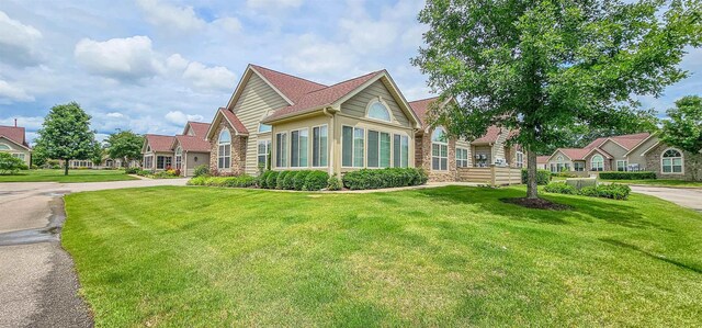 1601 E Southfield Cir, Memphis, TN 38016 - view of front of house with a front lawn
