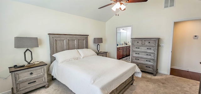 1601 E Southfield Cir, Memphis, TN 38016 - bedroom featuring light carpet, ensuite bathroom, baseboards, high vaulted ceiling, and ceiling fan