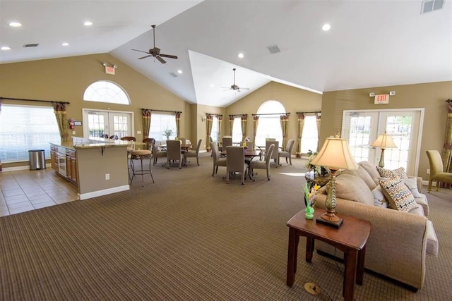 1601 E Southfield Cir, Memphis, TN 38016 - living room featuring french doors, light carpet, a ceiling fan, recessed lighting, and high vaulted ceiling