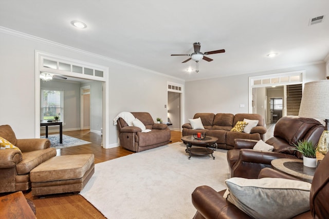 2045 Gallina Cir, Collierville, TN 38017 - living area featuring ceiling fan, wood finished floors, crown molding, and recessed lighting