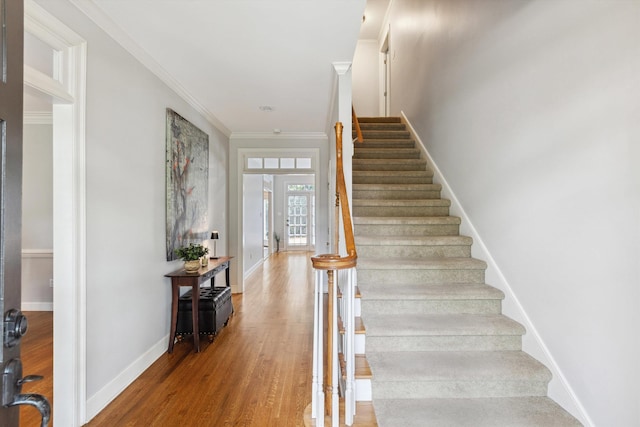 2045 Gallina Cir, Collierville, TN 38017 - staircase with wood finished floors and ornamental molding