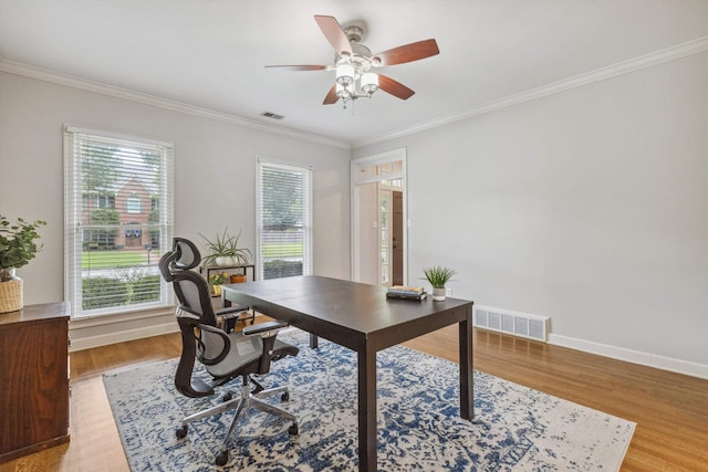 2045 Gallina Cir, Collierville, TN 38017 - home office featuring ornamental molding, light wood-style flooring, and a ceiling fan