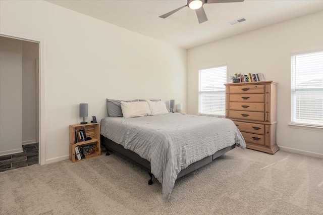 52 Twin Lakes Dr, Byhalia, MS 38611 - bedroom featuring light colored carpet, baseboards, and a ceiling fan
